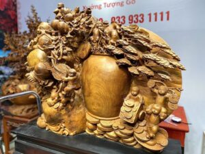 Di Lạc Vác Cành Đào Cửu Tiểu Chum Vàng Cây Tùng Gỗ Nu Hương