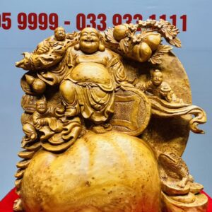 Di Lạc Tam Tiểu Vác Cành Đào Đứng Bao Tiền Gỗ Nu Ngọc Am