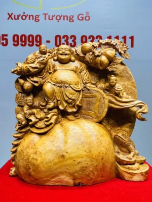 Di Lạc Tam Tiểu Vác Cành Đào Đứng Bao Tiền Gỗ Nu Ngọc Am