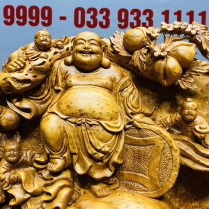 Di Lạc Tam Tiểu Vác Cành Đào Đứng Bao Tiền Gỗ Nu Ngọc Am