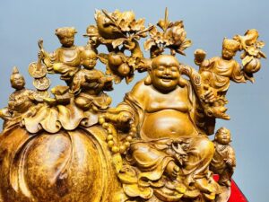 Di Lạc Ngũ Tiểu Vác Cành Đào Ngồi Bao Tiền Gỗ Nu Hương