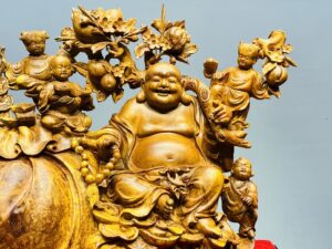 Di Lạc Ngũ Tiểu Vác Cành Đào Ngồi Bao Tiền Gỗ Nu Hương