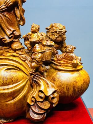 Di Lạc Vác Cành Đào Ngũ Tiểu Nhất Nghê Đứng Bao TIền Gỗ Nu Hương