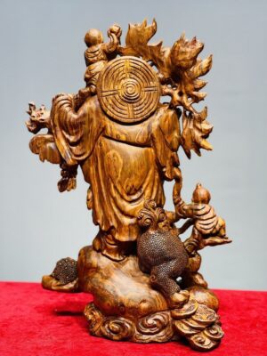 Di Lạc Nhị Tiểu Vác Cành Đào Đứng Bao Tiền Gỗ Sưa