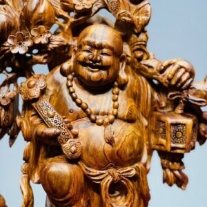 Di Lạc Nhị Tiểu Vác Cành Đào Đứng Bao Tiền Gỗ Sưa