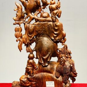 Di Lạc Vác Cành Đào Nhị Tiểu Nhất Nghê Đứng Bao Tiền Gỗ Sưa