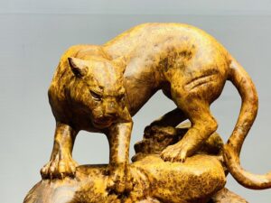 Báo Săn Mồi Gỗ Nu Ngọc Am
