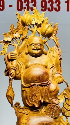 Di Lạc Vác Cành Đào Đứng Bao Tiền Gỗ Nu Hương