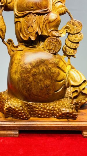 Di Lạc Vác Cành Đào Đứng Bao Tiền Gỗ Nu Hương