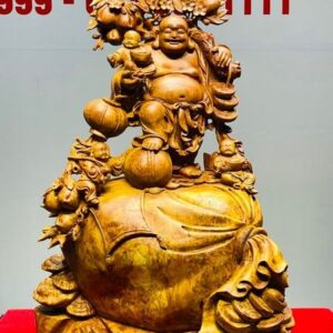 Di Lạc Tam Tiểu Vác Cành Đào Đứng Bao Tiền Gỗ Nu Hương
