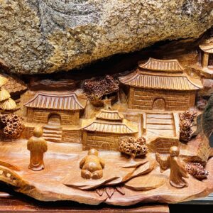Thành Tâm Bái Phật Gỗ Hương Ôm Đá Tự Nhiên