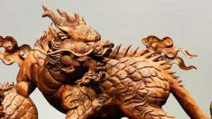 Song Kỳ Lân Đứng Cầu Gậy Như Ý Gỗ Sưa