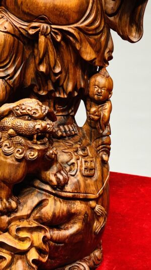 Di Lạc Vác Cành Đào Nhất Tiểu Đứng Bao Tiền Gỗ Sưa