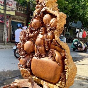Di Lạc Ngũ Phúc Tứ Linh Vác Cành Đào Đứng Bao Tiền Gỗ Nu Hương