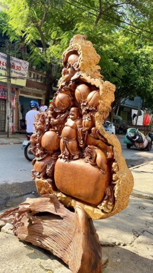 Di Lạc Ngũ Phúc Tứ Linh Vác Cành Đào Đứng Bao Tiền Gỗ Nu Hương
