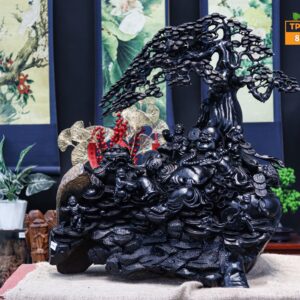 Di lặc ngồi gốc tùng gỗ mun