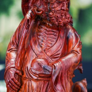 Đạt ma hành khất gỗ trắc