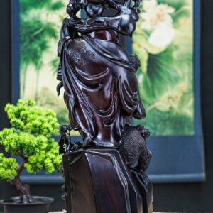 Di lặc vác cành đào