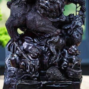 Di lặc vác cành đào