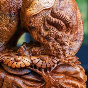 Lân sư gỗ hương  ( trái + phai )
