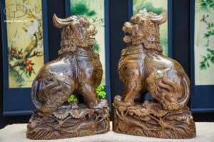 Lân sư mun đuôi công ( trái + phải )