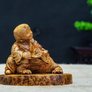 tiểu đồng ôm thiềm thừ